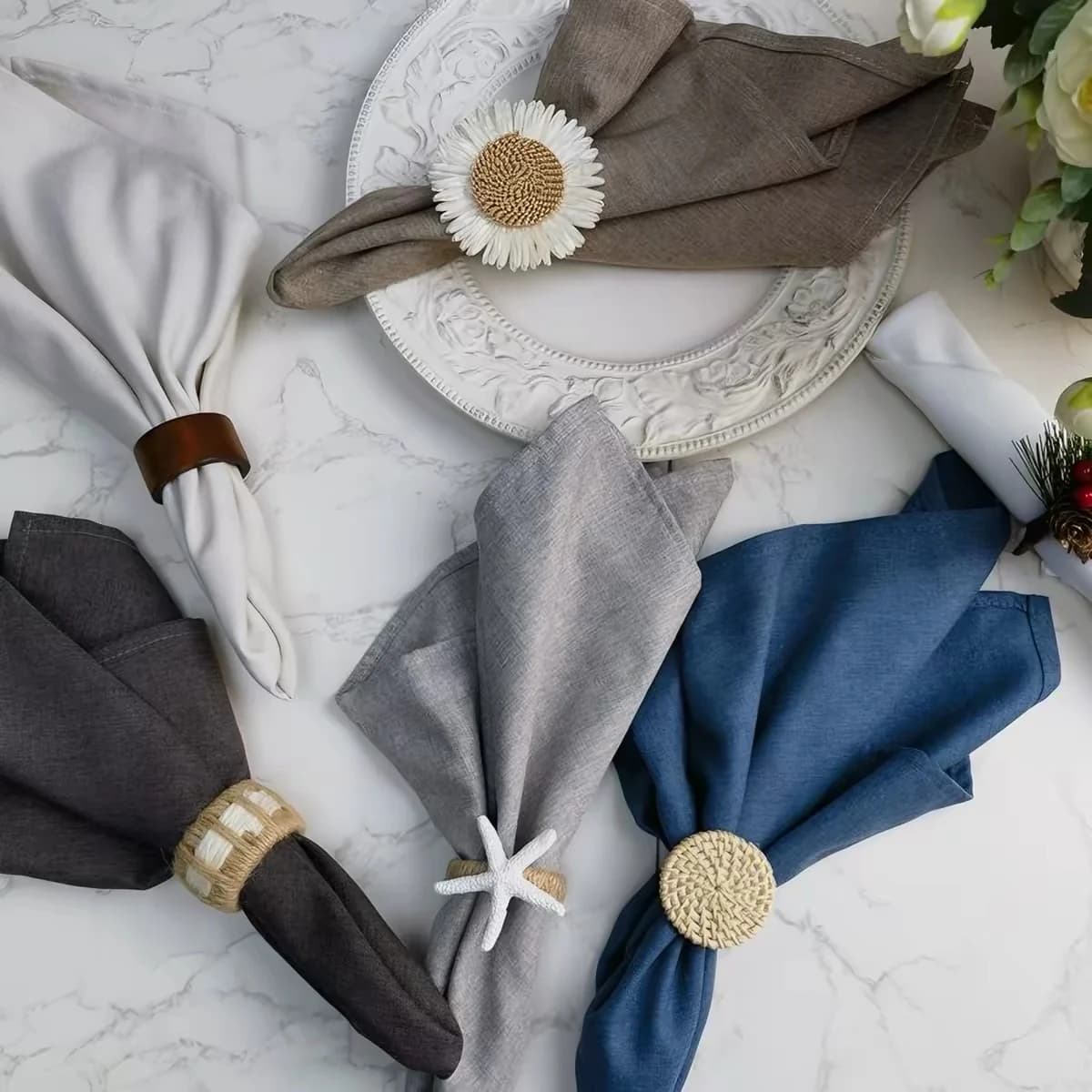 Folded neutral napkin on a dining plate