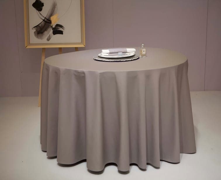 Round banquet tablecloth in a hospitality dining setting