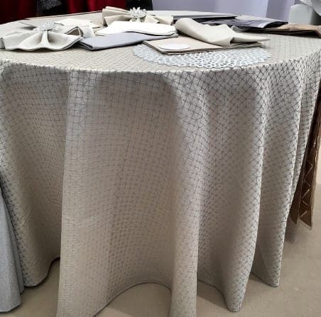 Textured tablecloth with a full drop